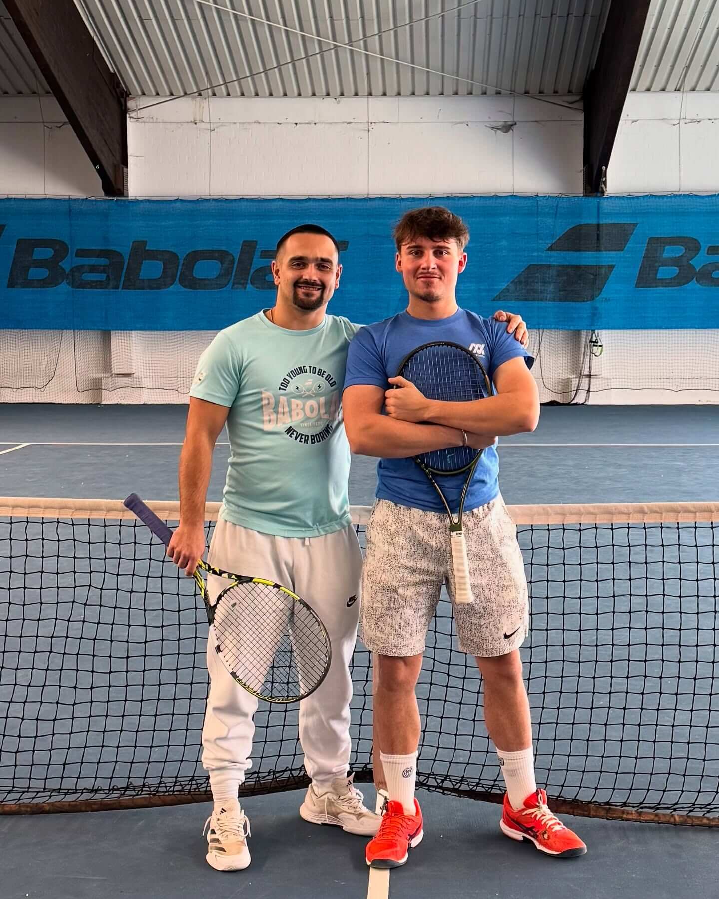 Paul Dollinger with his coach at nensel tennis academy