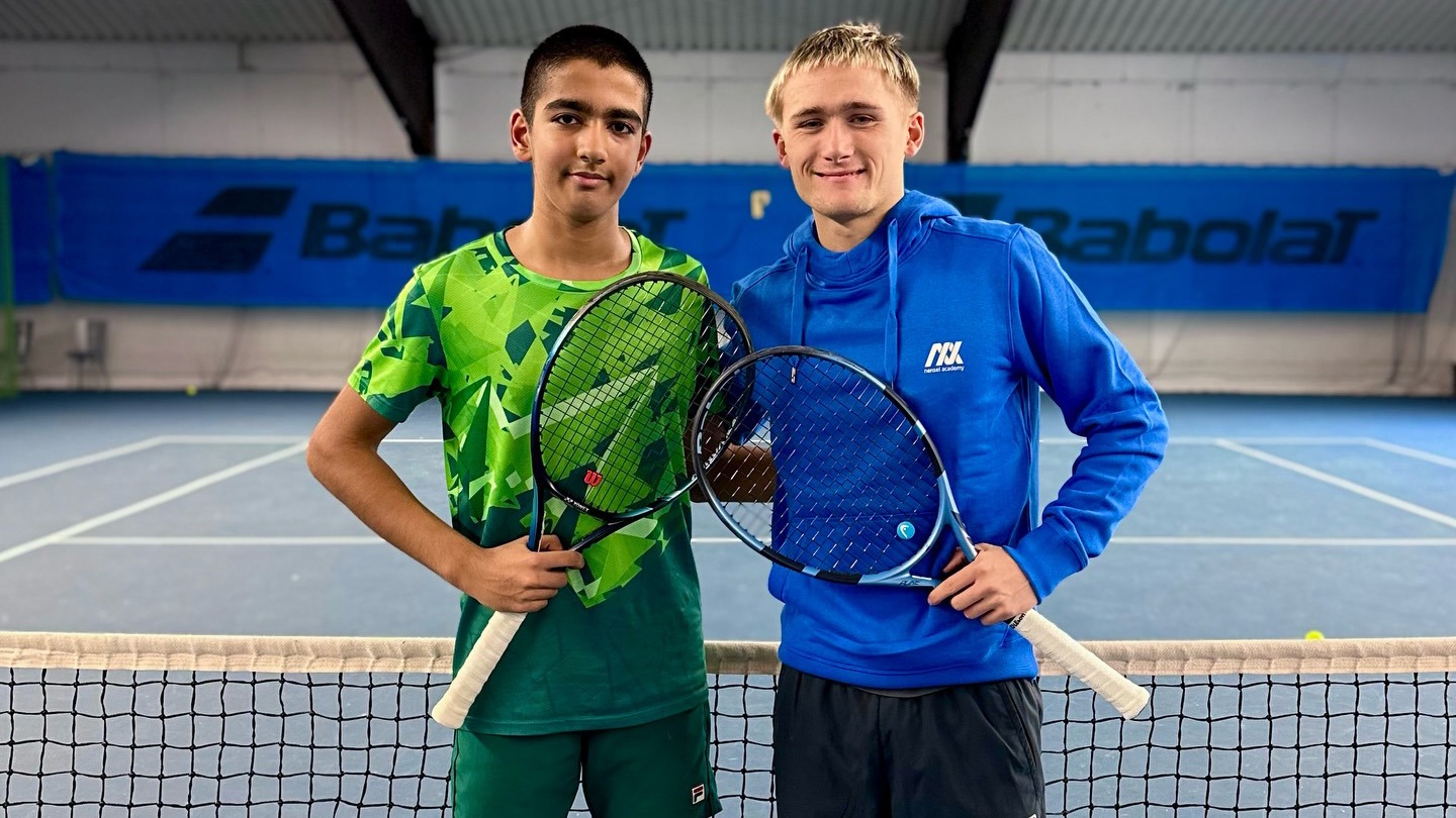 Sunit Lumb and coach Jasper Camehn standing together on a tennis court at the nensel academy 2026